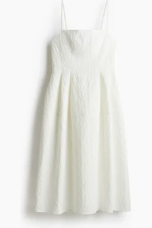 H&M Robe en tissu jacquard