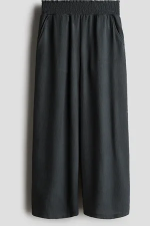 H&M Pantalon smocké à effet froissé