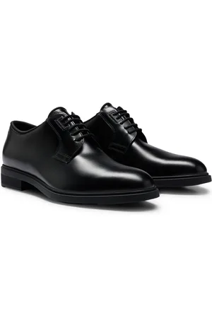 HUGO BOSS Chaussures derby en cuir italien avec finitions passepoilées