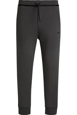 HUGO BOSS Bas de survêtement en coton mélangé avec bandes et logo