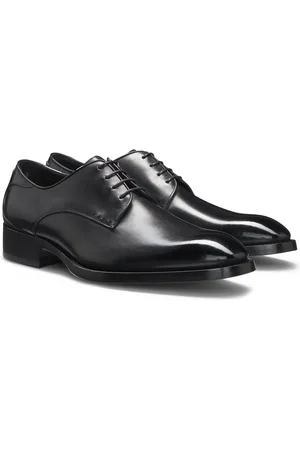 HUGO BOSS Chaussures derby en cuir bruni avec surpiqûres
