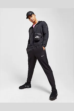 Pantalon nike bouton pression hot sale