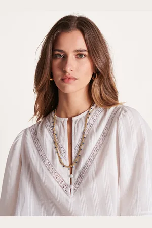 La Fee Maraboutee Collier métal doré enroulé et petites perles bleues