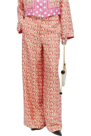 VERSACE Femme, Pantalons, Rose, Taille: 36 FR Pantalon en Soie avec Logo Imprimé
