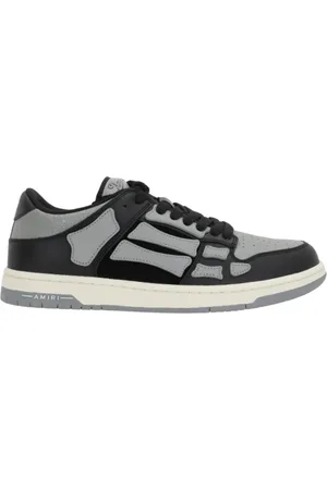 AMIRI Homme, Chaussures, Gris, Taille: 44 EU Baskets basses grises en cuir et daim