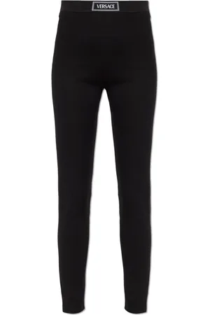 VERSACE Femme, Pantalons, Noir, Taille: 34 FR Leggings avec patch logo