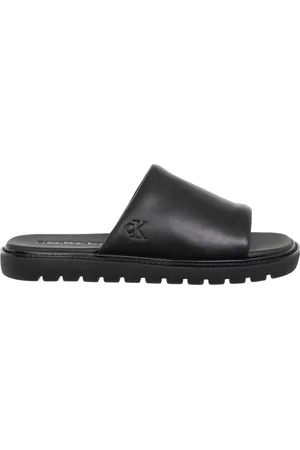 Calvin Klein Homme, Chaussures, Noir, Taille: 44 EU Mules Unies pour Femmes