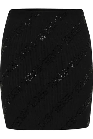 Gestuz Femme, Jupes, Noir, Taille: 36 FR Mini-jupe noire courte et ajustée