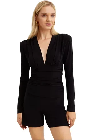 Norma Kamali Femme, Combinaisons et Ensembles, Noir, Taille: 42 FR Combinaison noire avec décolleté en V et taille drapée