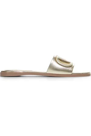 VALENTINO GARAVANI Femme, Chaussures, Jaune, Taille: 38 1/2 EU Mules en cuir laminé VLogo