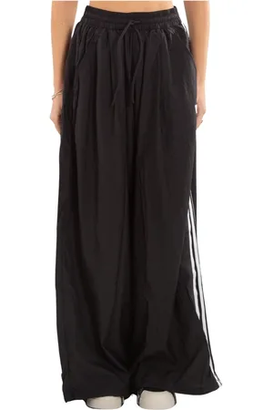 Y-3 Femme, Pantalons, Noir, Taille: 38 FR Pantalon ample en nylon noir à 3 bandes