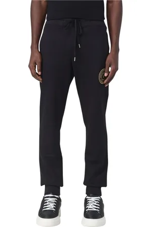 VERSACE Homme, Pantalons, Noir, Taille: S Joggers Noirs avec Détail en Or
