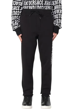 VERSACE Homme, Pantalons, Noir, Taille: M Homme Moderne Gris Logo Joggers