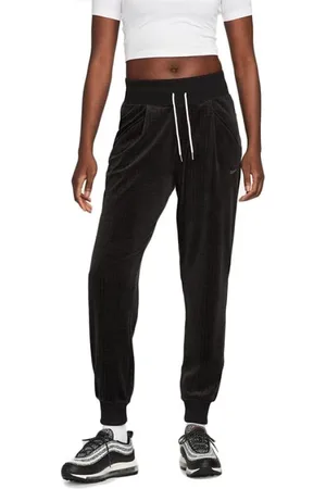 Nike Femme, Pantalons, Noir, Taille: 36 FR Velour Joggers Noir Élégant Style Moderne