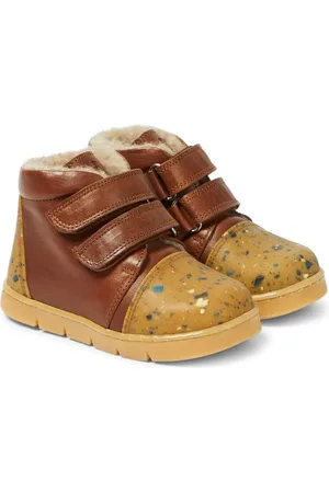 Petit Nord Bottines en cuir et shearling