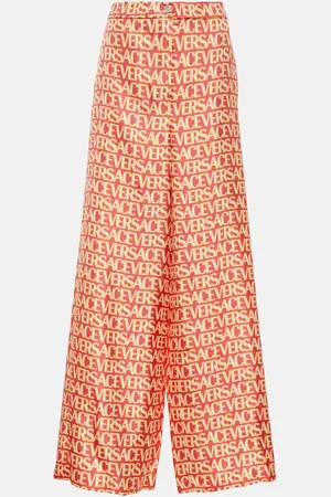 VERSACE Pantalon ample Allover en soie
