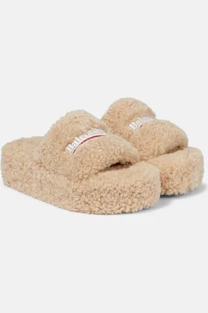 Balenciaga Mules en shearling synthétique à logo