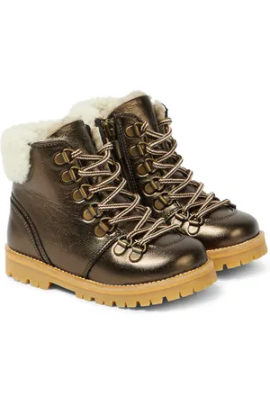 Petit Nord Bottines en cuir et shearling