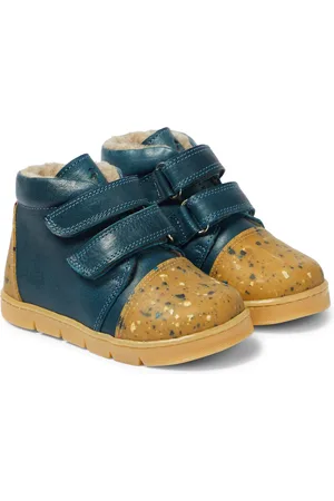 Petit Nord Bottines en cuir et shearling