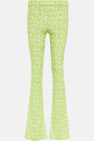 VERSACE Pantalon évasé en velours à logo