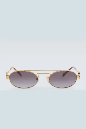 Miu Miu Lunettes de soleil ovales à logo