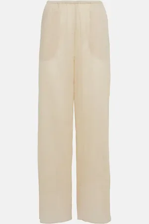 Totême Pantalon ample Monogram en coton mélangé
