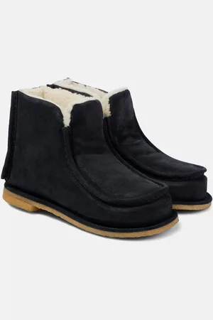 J.W.Anderson Bottines en cuir et shearling