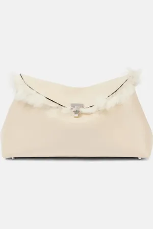 Totême Pochette T-Lock en cuir et shearling