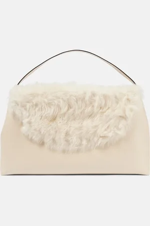 Totême Sac T-Lock Large en cuir et shearling