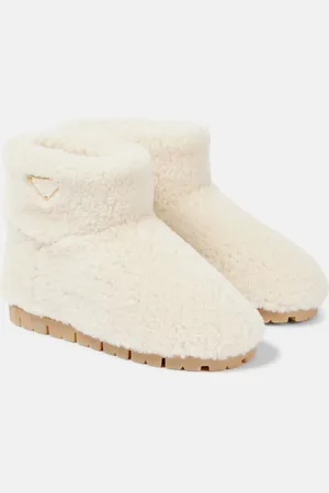 Prada Bottines en shearling à logo