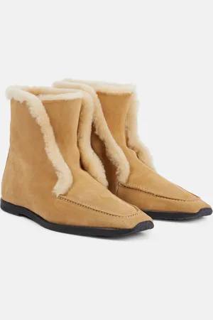 Totême Bottines en daim et shearling