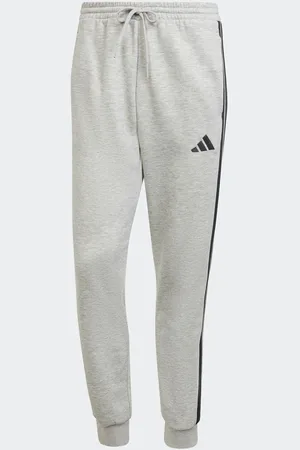 adidas Essentiels Pantalon de jogging polaire à rayures 3 M Reg