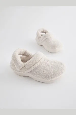 Next Chaussons style sabot en imitation peau de mouton