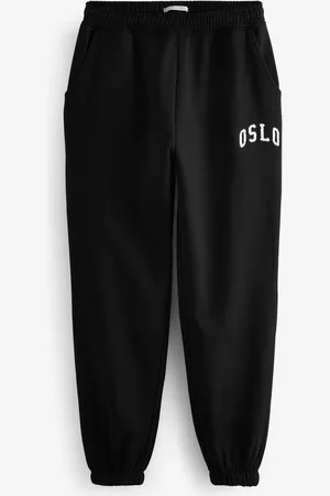 Next Pantalon de jogging à poignets avec détails bouclés City Graphic Oslogan SloganGrand
