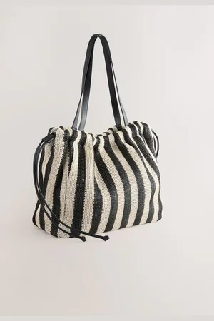 Next Sac à bandoulière en raphiaUn an
