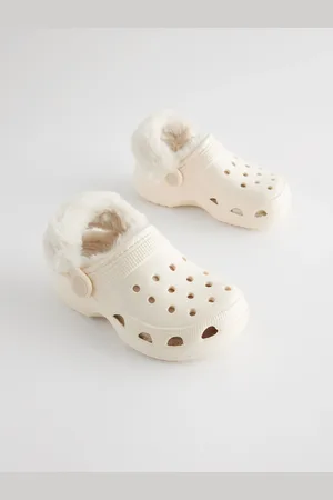 Next Chaussons sabots doublés de fausse fourrure