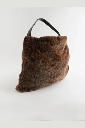 Next Sac à bandoulière en fourrure synthétiqueUn an