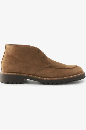 Next Bottes tablier en daim Signature