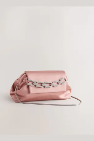Next Pochette ornée de bijouxUn an