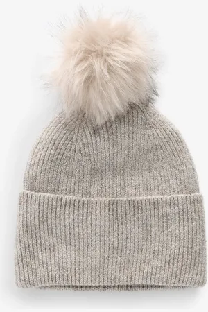 Next Bonnet à pompons en maille étincelanteUn an