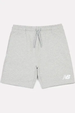 New Balance Garçons 100% Coton Short à logo superposé en tissu éponge français7 - 8 ans (122 - 128cm)
