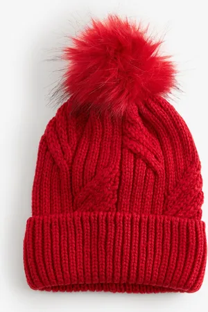 Next Bonnet à pompon en maille torsadéeUn an