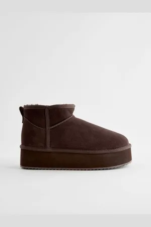 Next Bottes en daim doublées de fausse fourrure à super plateforme et hydrofuges