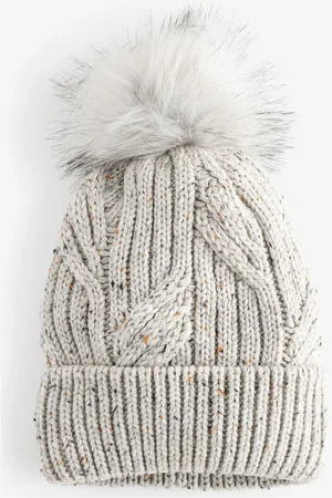Next Bonnet à pompon en maille torsadéeUn an