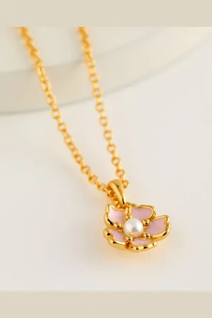 Ted Baker PETIIES: Collier avec pendentif fleur peinteUn an