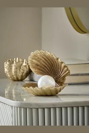 Next Décoration de la coquille de palourdeUn an