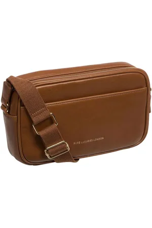 PURE LUXURIES LONDON Sac à bandoulière en cuir Dion NappaUn an