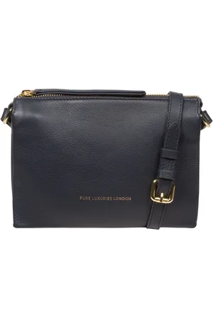 PURE LUXURIES LONDON Sac à bandoulière Niki Nappa en cuirUn an