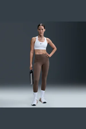 Nike Legging taille haute à maintien normal et coupe longue avec poches Universa pour femme
