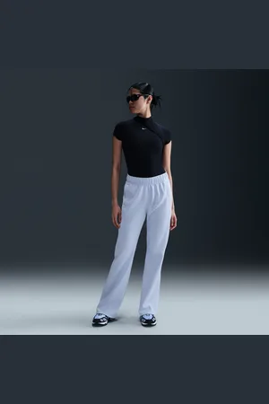 Nike Pantalon en maille coupe slim à taille mi-haute Sportswear Windrunner pour femme